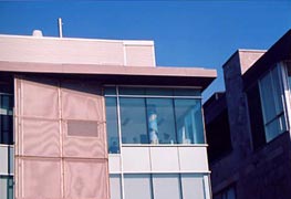 View of the Genome and Proteome Center, McGill University from outside.  We see the painting in Dr Hudson's office.